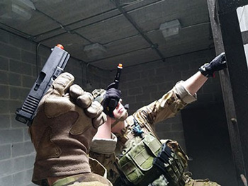 Airsoft pistol being used in an airsoft match